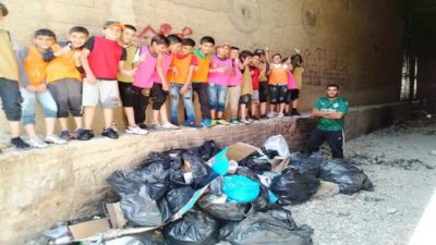 مدرسة الشهابية تشارك في تنظيف منطقة عين ساره
